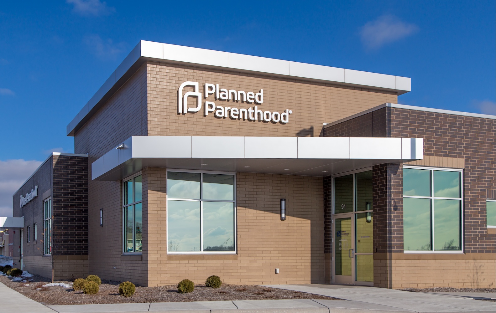 Man charged after opening fire outside Kansas Planned Parenthood ...