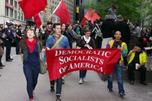Members of the Democratic Socialists of America march at the Occupy Wall Street protest in New York. 17 September 2011. By David Shankbone